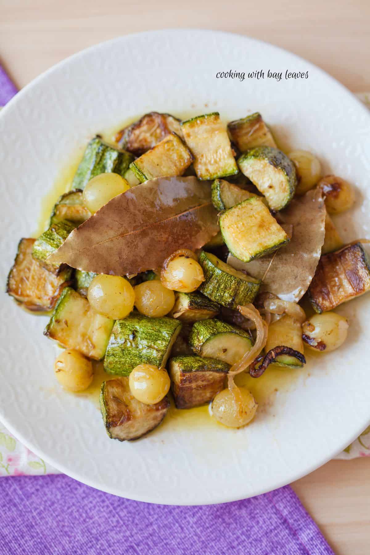 A sauteed zucchini dish with a bat leaf in it