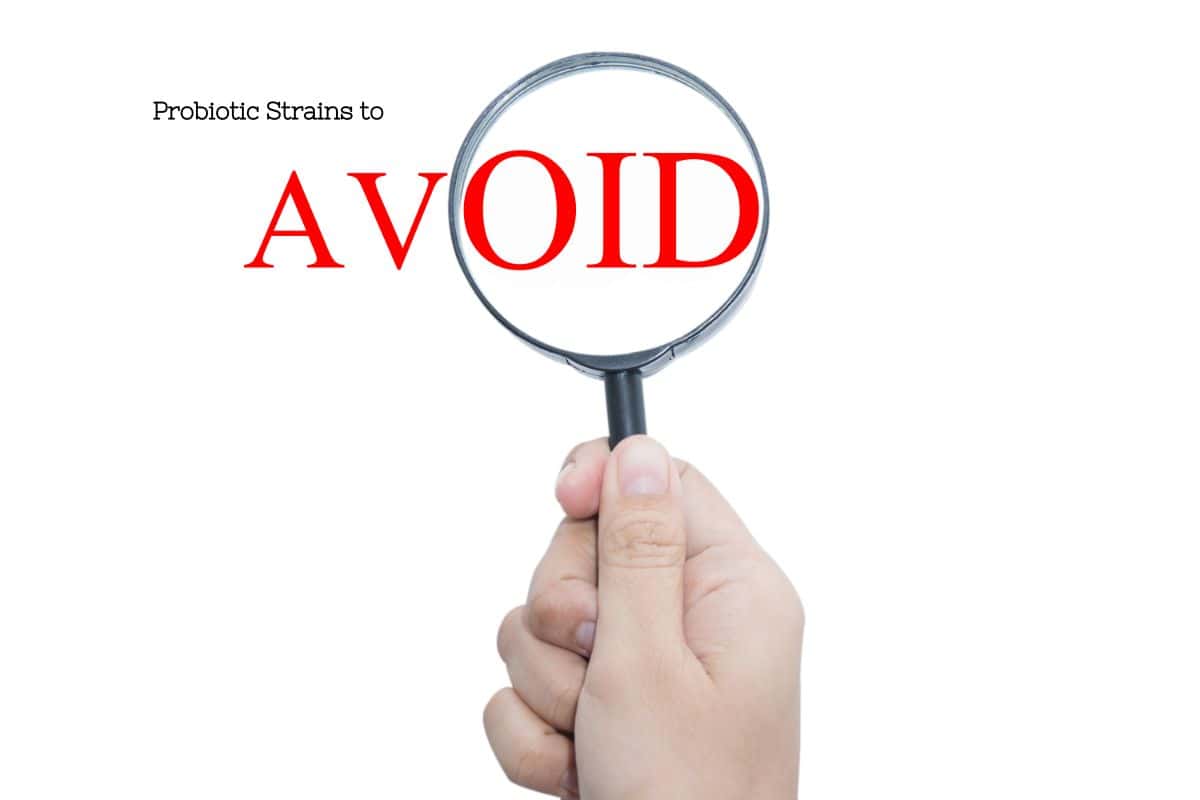 A magnifying glass highlights the word "AVOID" over a blurred list, indicating certain probiotic strains to steer clear of for histamine intolerance.