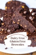 Pinnable image featuring dairy-free gluten-free brownies with the caption 'Dairy Free Gluten Free Brownies' over a backdrop of the finished dessert