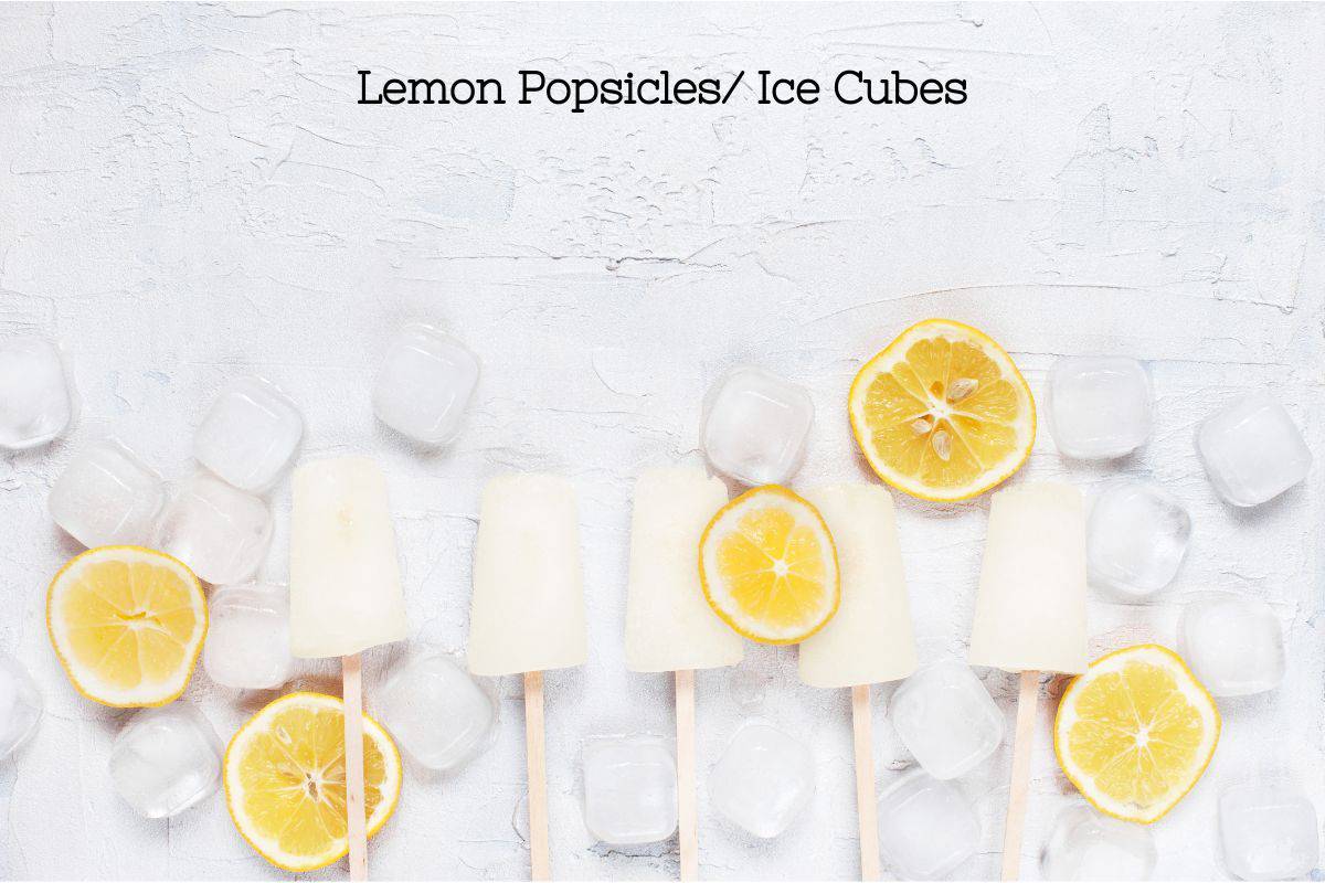 A decorative photo of 5 lemon juice ice pops on popsicle sticks surrounded by lemon slices and ice cubes.