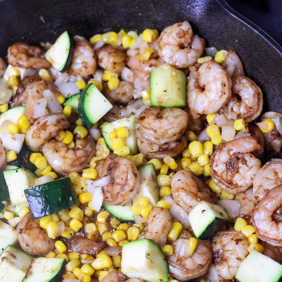 Cajun shrimp skillet with zucchini and corn added.
